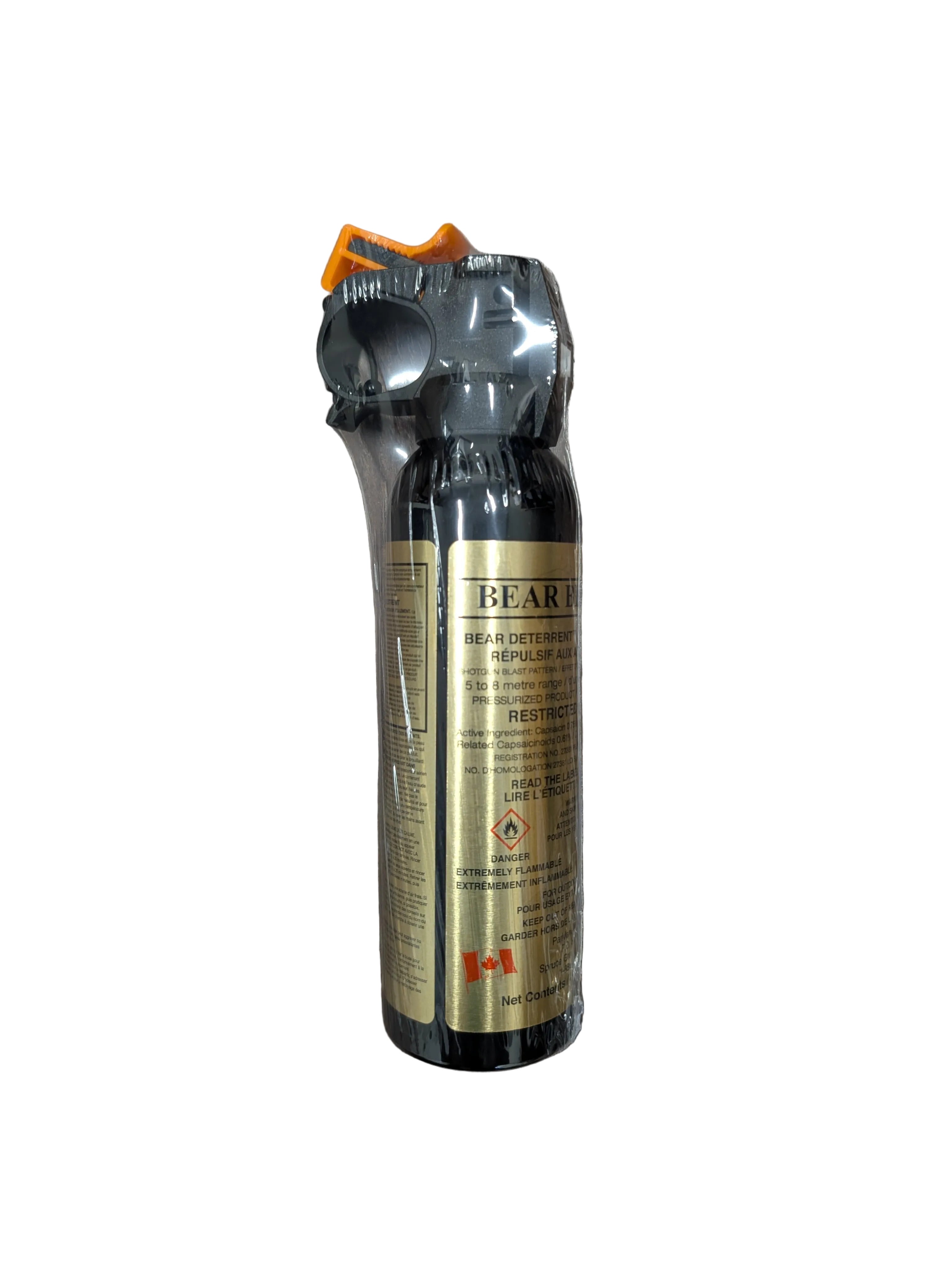 A Bear Defense personal safety spray canister with a black body, gold label, and orange spray trigger, standing upright