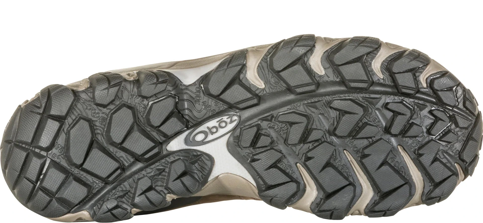 Close-up of a hiking shoe sole with tread pattern on a white background