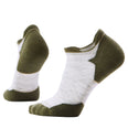 Pair of green and white ankle socks on a light gray background