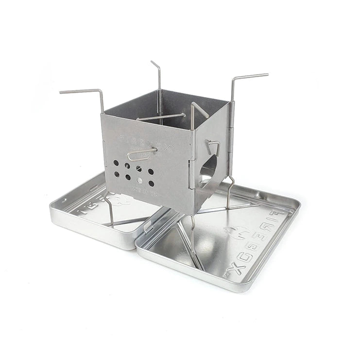 Metal camping stove on a white background